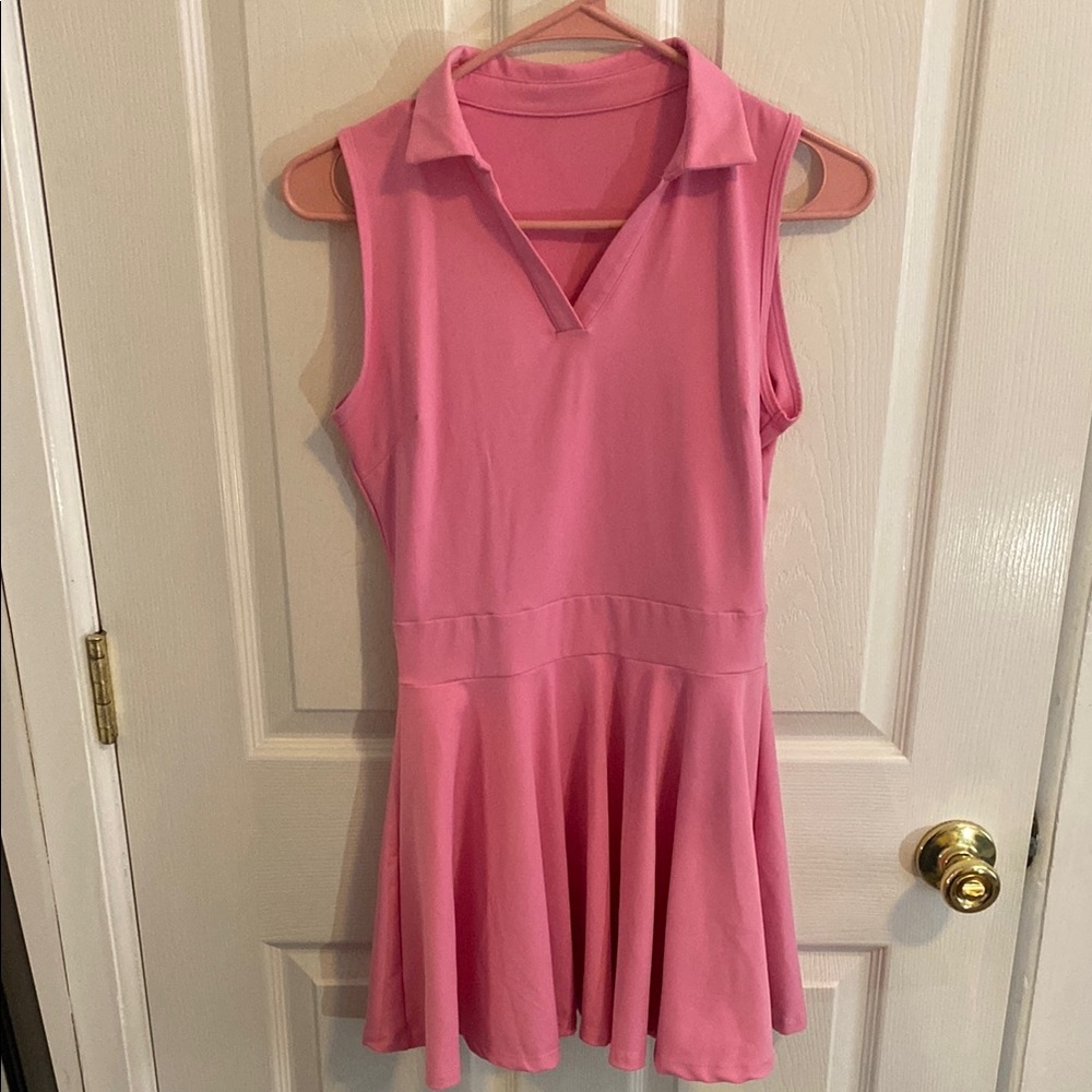 Pink Sleeveless small tennis or golf dress.